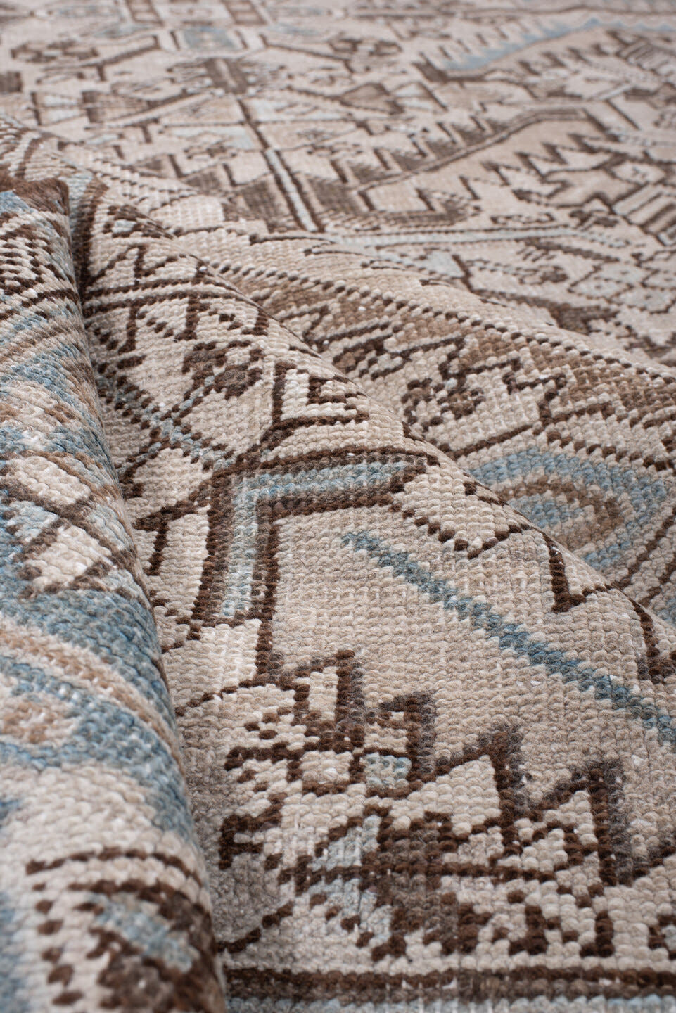 7' x 11' one-of-a-kind handmade antique Heriz large size rug. Color palette: ivory, blue gray, taupe, chocolate brown, slate