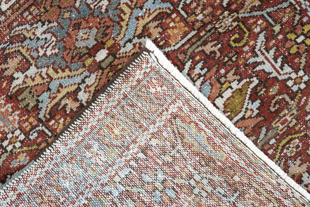7' x 10' one-of-a-kind handmade antique Heriz large size rug. Color palette: rust, powder blue, ivory, olive, rose, charcoal