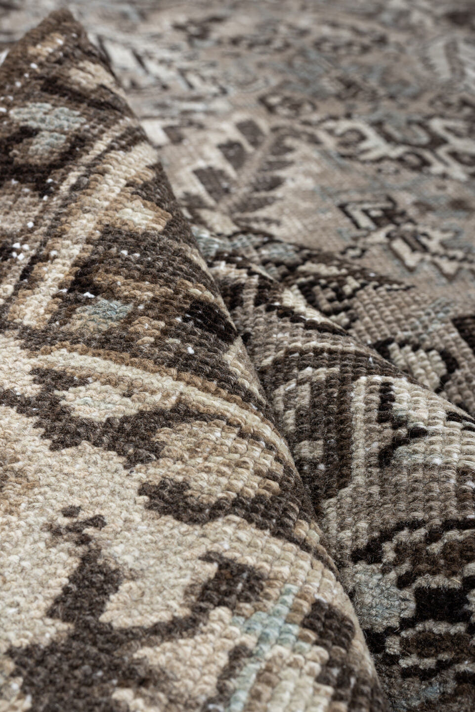 7' x 9' one-of-a-kind handmade antique Heriz large size rug. Color palette: ivory, taupe, charcoal, pale blue, gray, brown