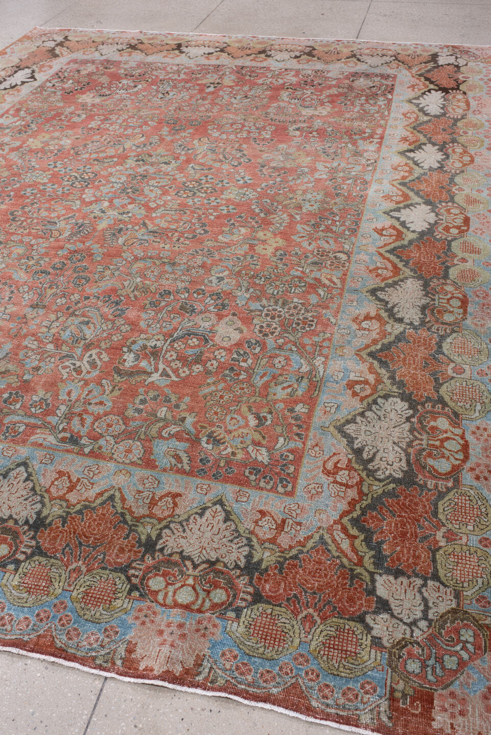 8' x 11' one-of-a-kind handmade antique Sarouk large size rug. Color palette: terracotta, powder blue, ivory, rust, charcoal