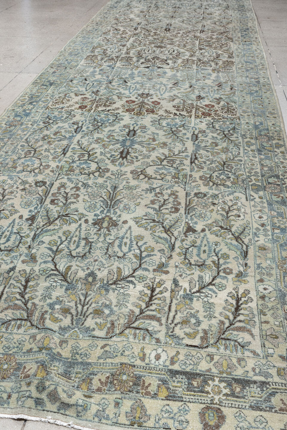 5' x 19' one-of-a-kind handmade antique Lilian rug. Color palette: ivory, powder blue, sage, taupe, brown, soft rust