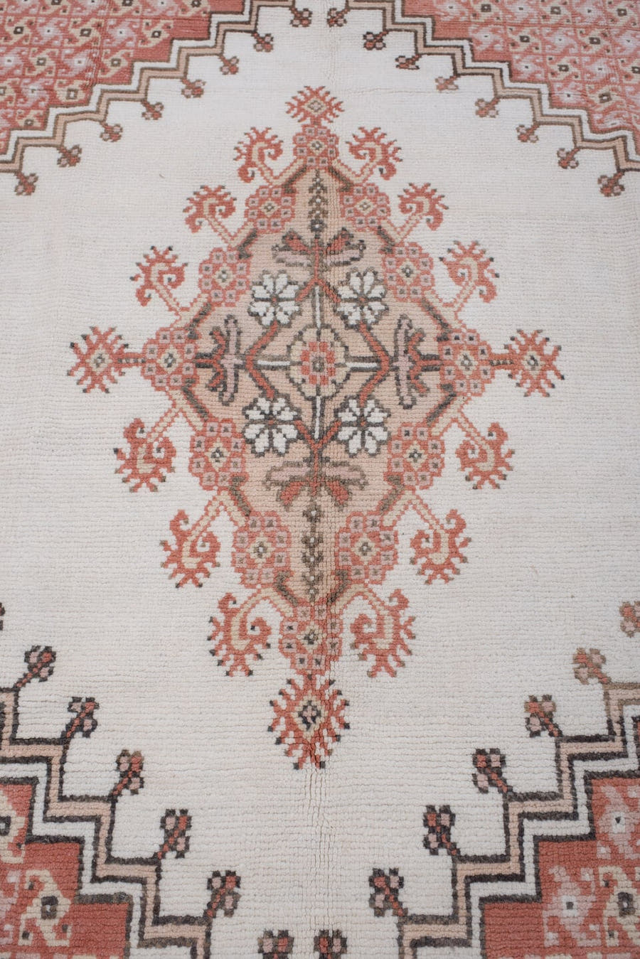 7' x 10' one-of-a-kind handmade antique Moroccan large size rug. Color palette: ivory, terracotta, charcoal, dark brown