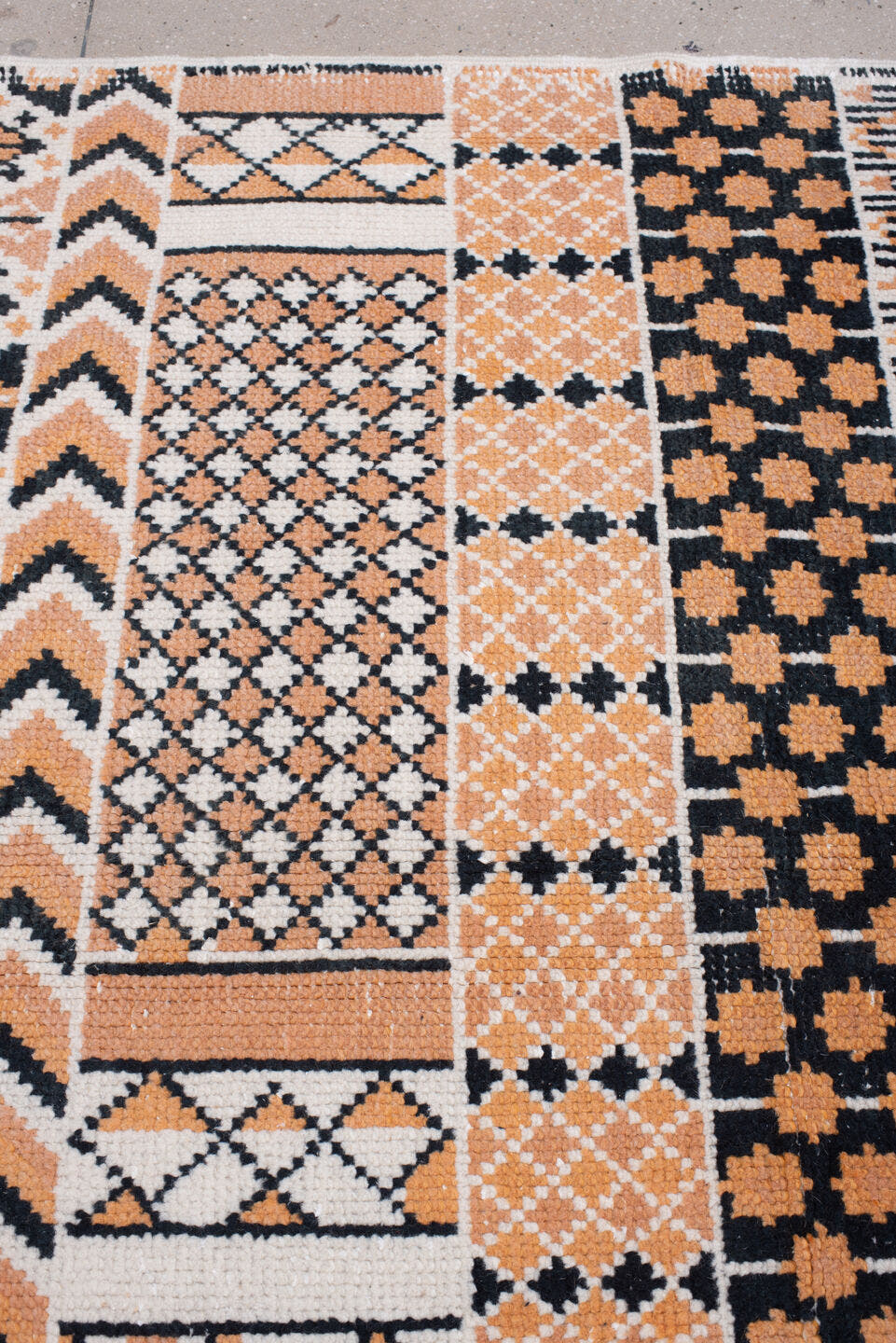 8' x 11' one-of-a-kind handmade antique Moroccan large size rug. Color palette: camel, ivory, ebony, charcoal, taupe, beige