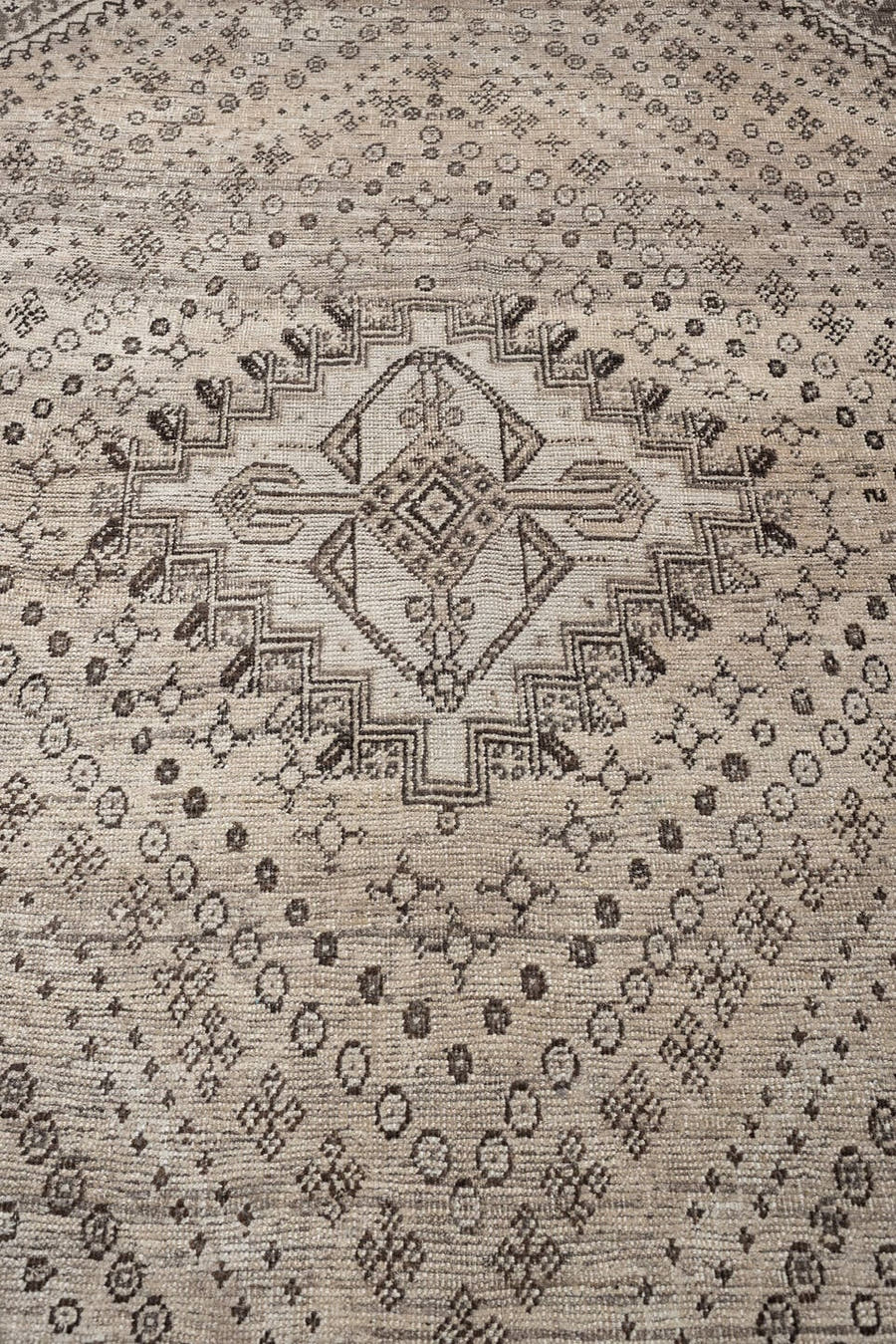 5' x 9' one-of-a-kind handmade antique Shiraz medium size rug. Color palette: ivory, taupe, charcoal, brown, camel, ebony