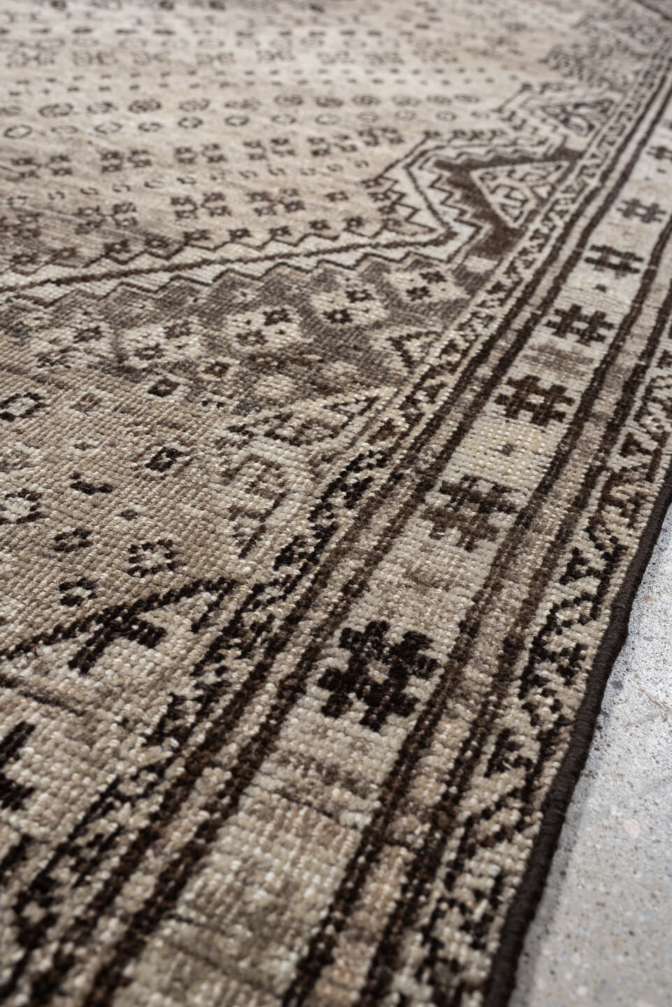 5' x 9' one-of-a-kind handmade antique Shiraz medium size rug. Color palette: ivory, taupe, charcoal, brown, camel, ebony