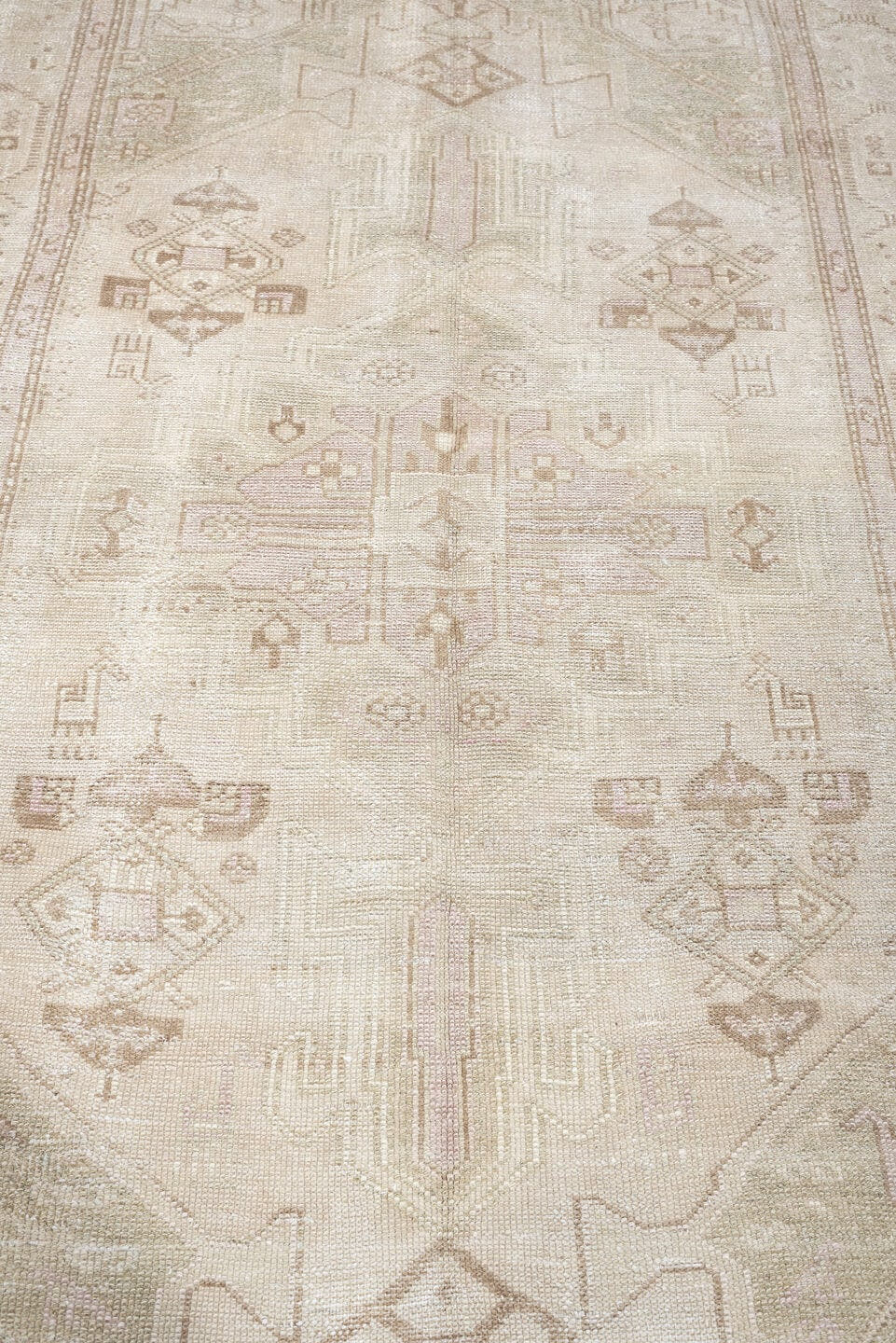 4' x 7' one-of-a-kind handmade antique rug. Color palette: ivory, cream, taupe, sand, sage, beige, pale brown, gray, green