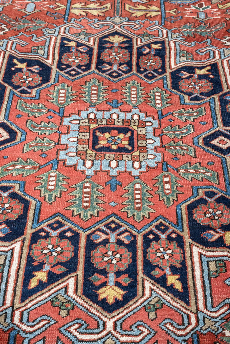8' x 10' one-of-a-kind handmade antique Heriz large size rug. Color palette: rust, sky blue, navy, ivory, coral, sage, camel