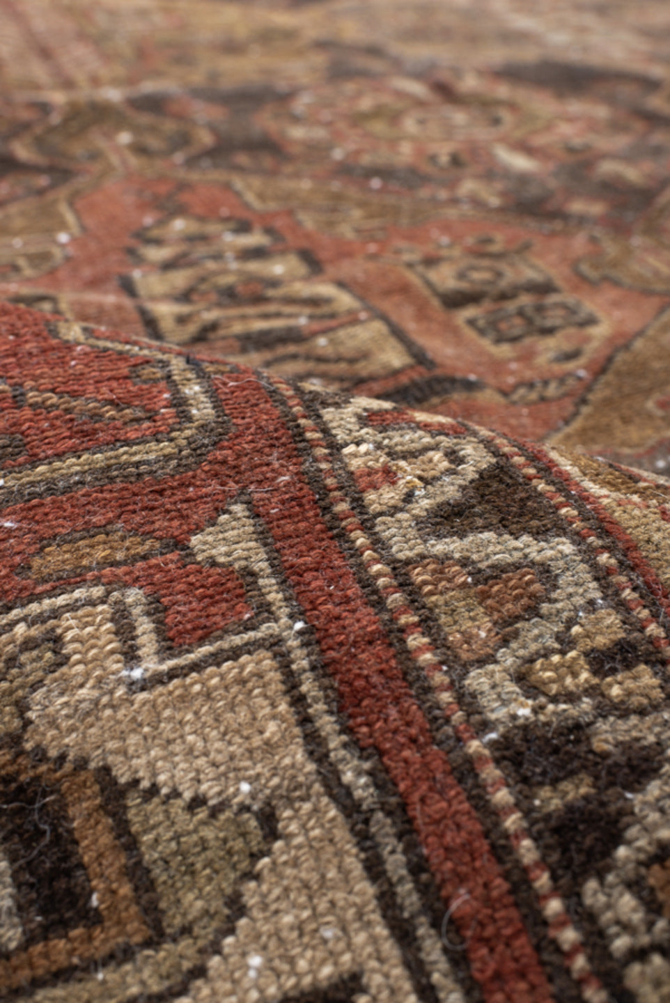 6' x 9' one-of-a-kind handmade vintage medium size rug. Color palette: brown, off-white, orange, pink, gray, black