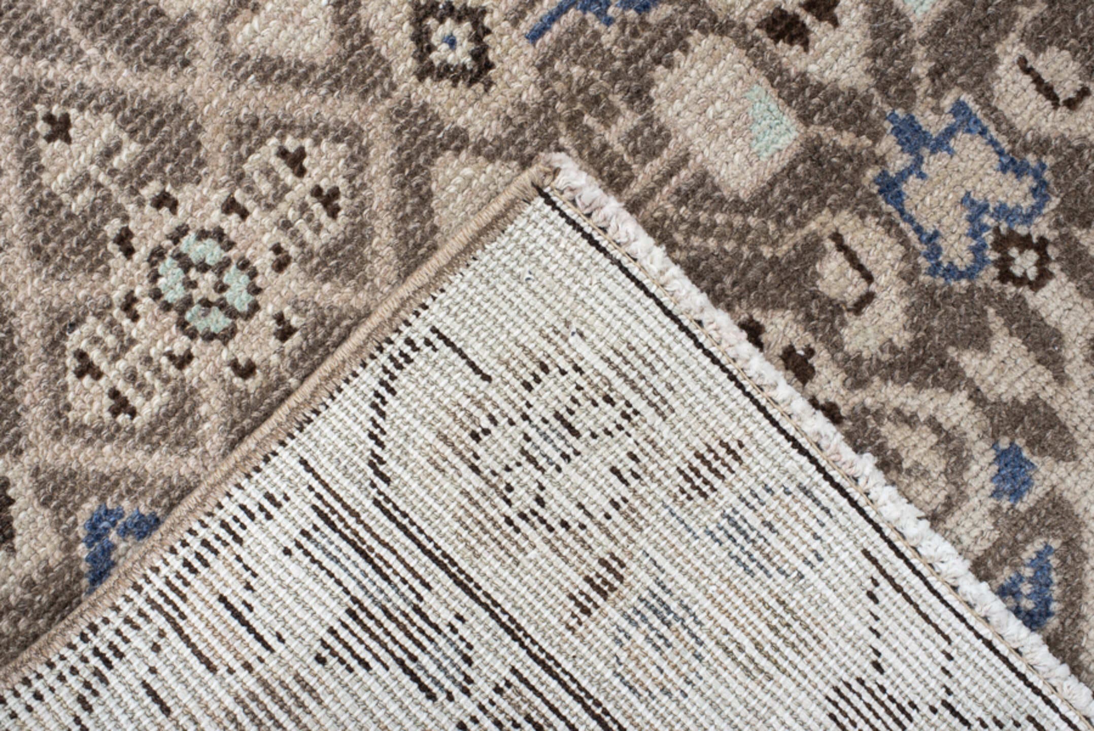 3' x 9' one-of-a-kind handmade vintage runner rug. Color palette: taupe, ivory, brown, blue, charcoal, beige, gray, black