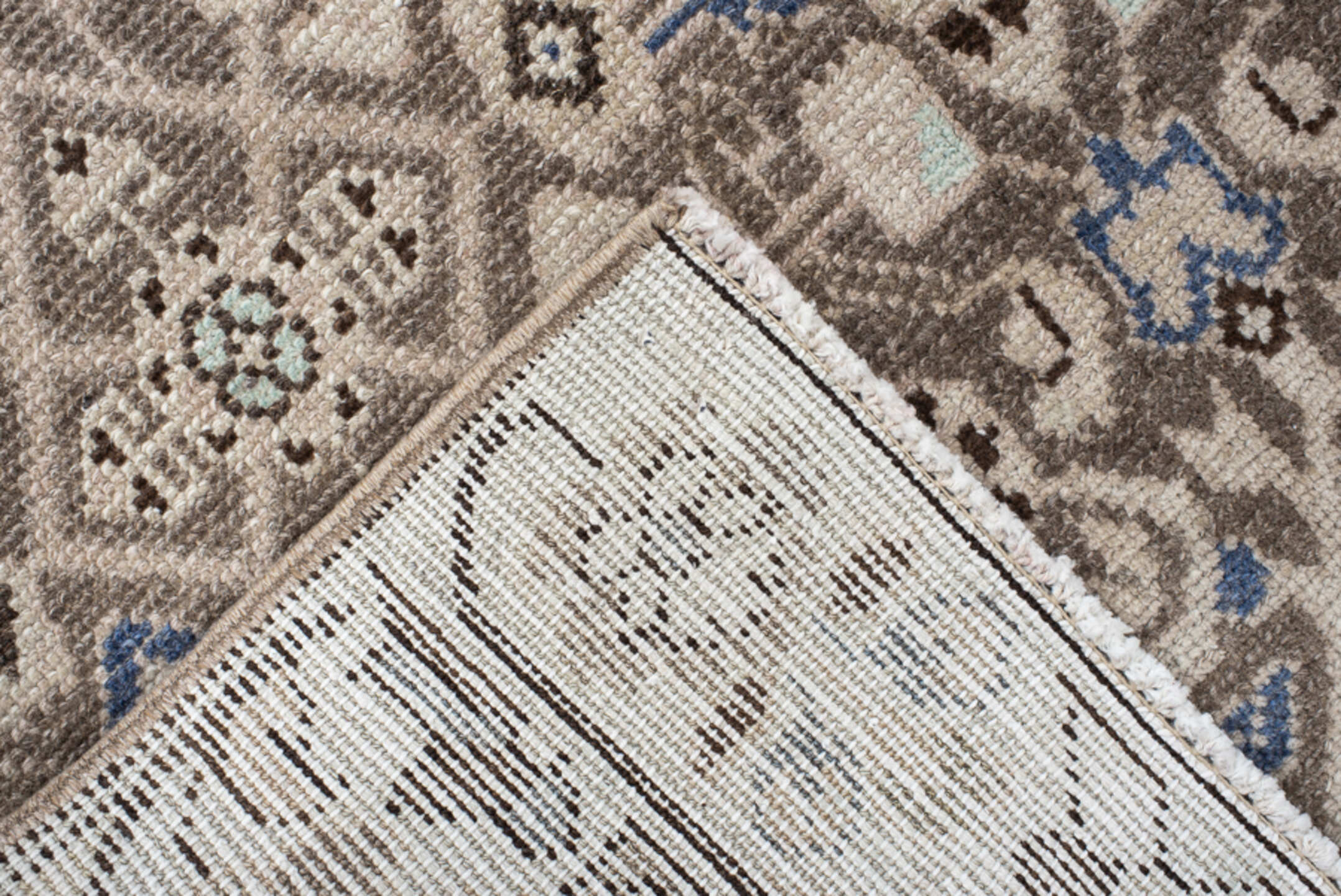 3' x 9' one-of-a-kind handmade vintage runner rug. Color palette: taupe, ivory, brown, blue, charcoal, beige, gray, black