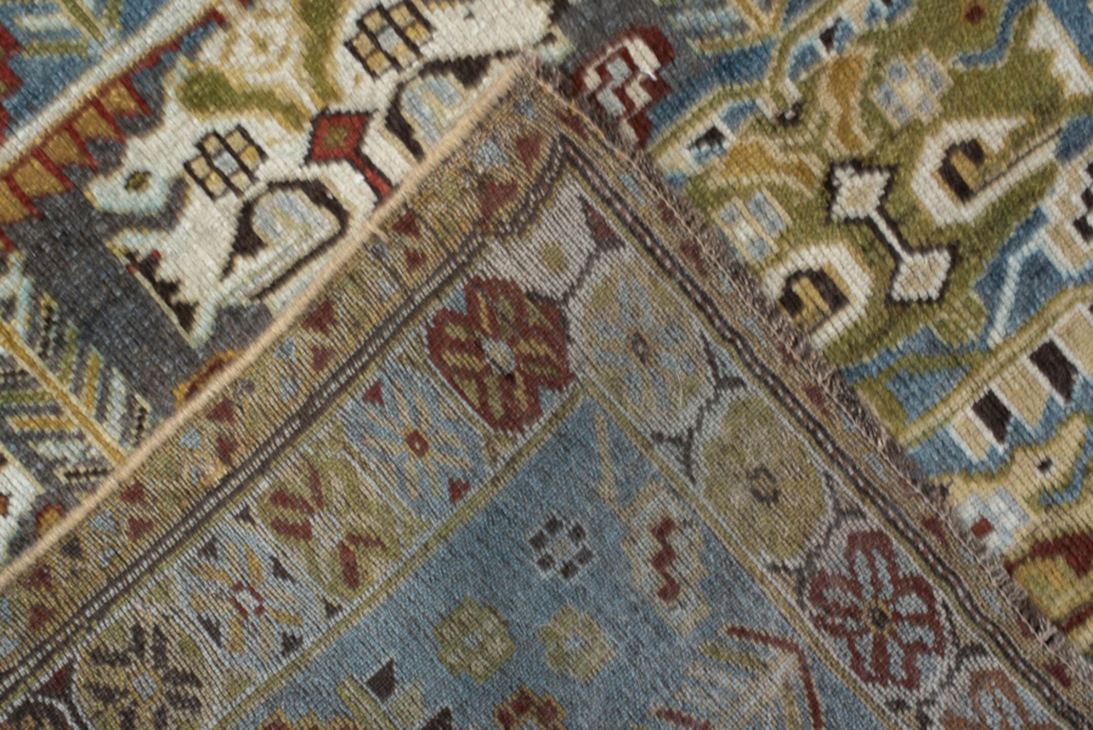 3' x 9' one-of-a-kind handmade vintage NW Persian runner rug. Color palette: ivory, sky blue, olive, rust, brown, charcoal