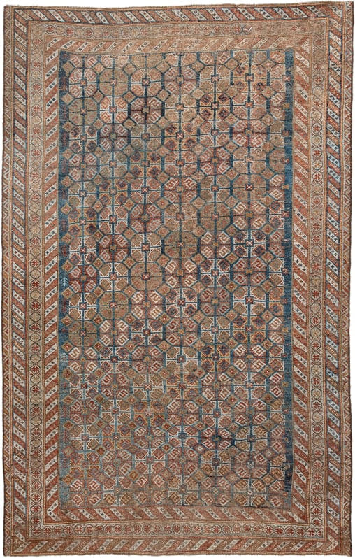 4' x 7' one-of-a-kind handmade vintage Shiraz rug. Color palette: terra cotta, camel, blue, ivory, rust, taupe, terracotta