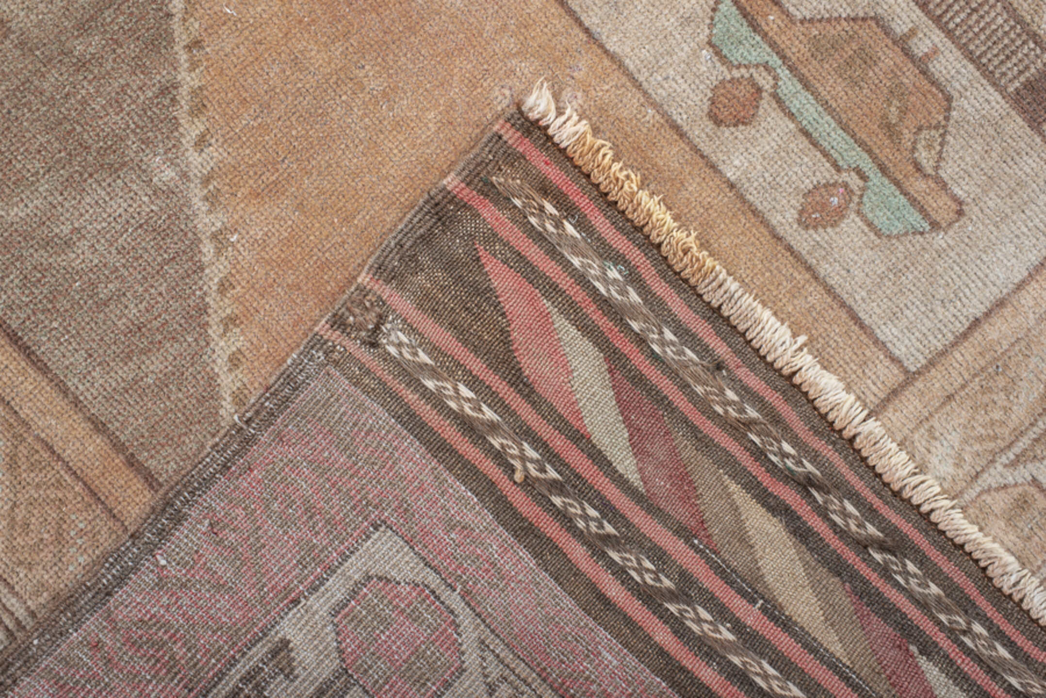 4' x 6' one-of-a-kind handmade vintage Belouch small size rug. Color palette: camel, taupe, brown, ivory, charcoal, rose