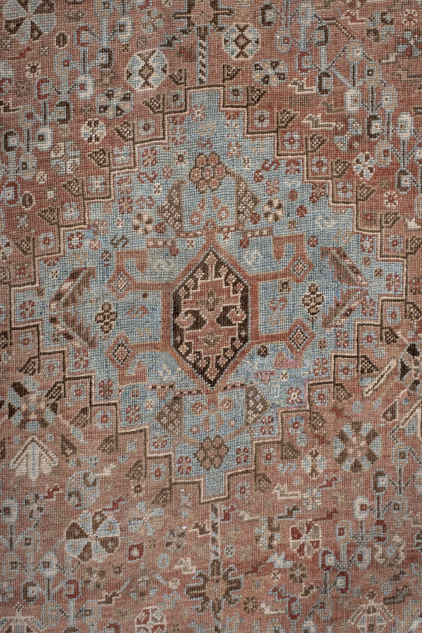 5' x 8' one-of-a-kind handmade vintage Shiraz medium size rug. Color palette: terra cotta, powder blue, ivory, brown, taupe