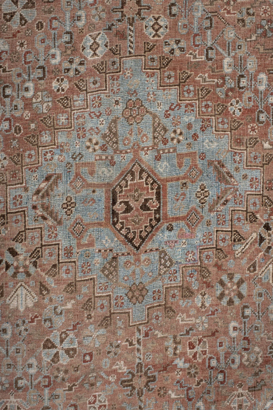 5' x 8' one-of-a-kind handmade vintage Shiraz medium size rug. Color palette: terra cotta, powder blue, ivory, brown, taupe
