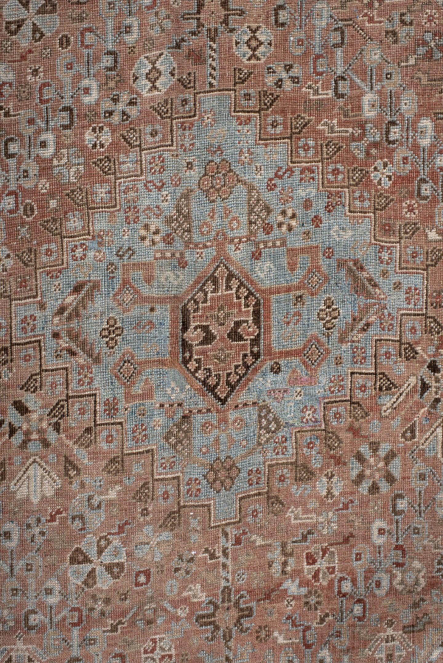 5' x 8' one-of-a-kind handmade vintage Shiraz medium size rug. Color palette: terra cotta, powder blue, ivory, brown, taupe