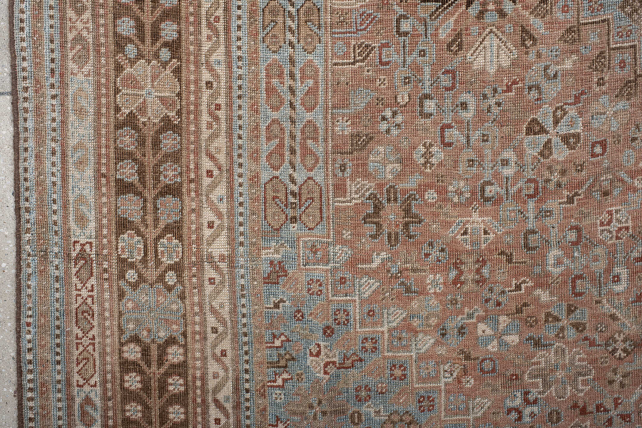 5' x 8' one-of-a-kind handmade vintage Shiraz medium size rug. Color palette: terra cotta, powder blue, ivory, brown, taupe