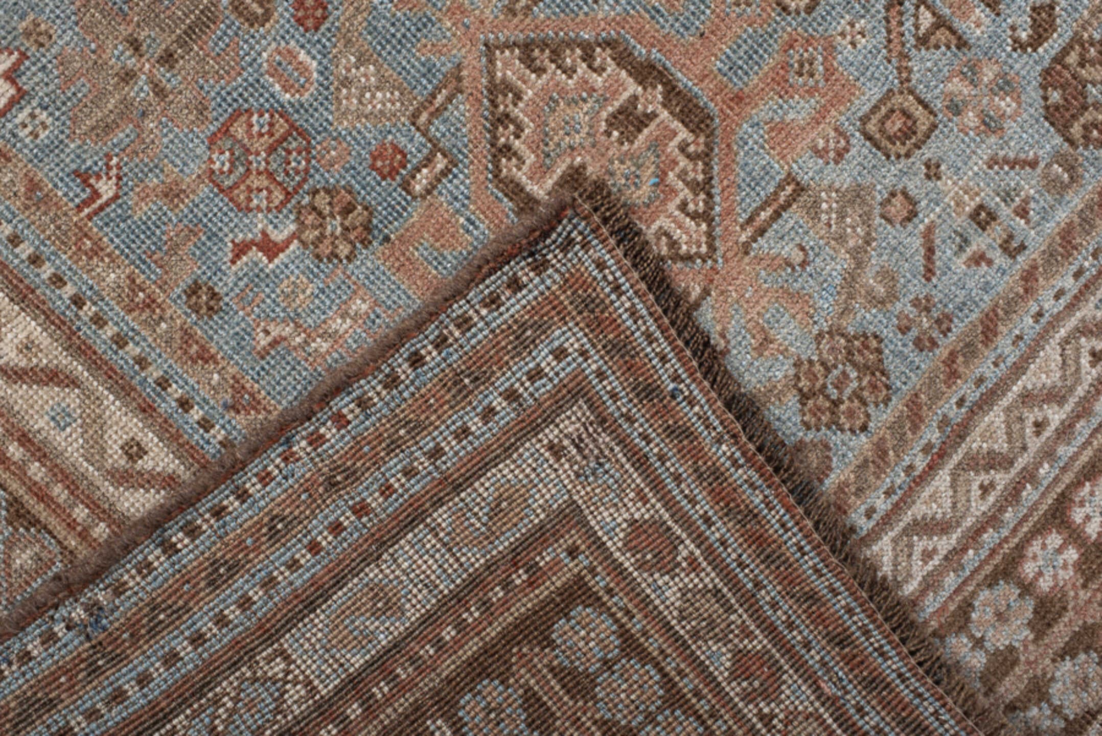 5' x 8' one-of-a-kind handmade vintage Shiraz medium size rug. Color palette: terra cotta, powder blue, ivory, brown, taupe