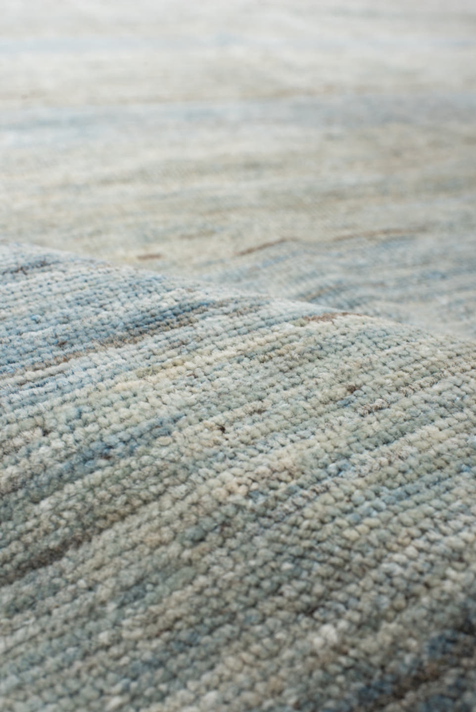 10' x 12' one-of-a-kind handmade vintage Gabbe large size rug. Color palette: ivory, pale blue, sky blue, beige, taupe