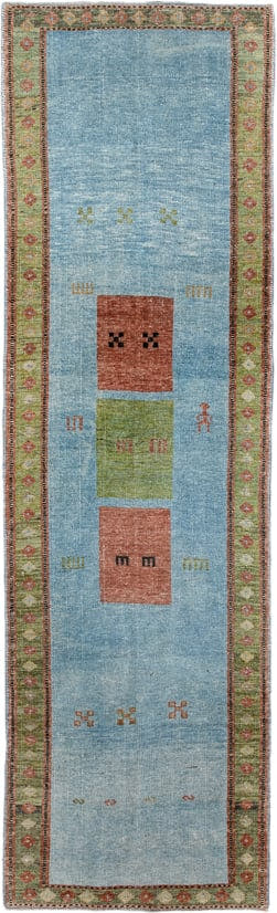 3' x 9' one-of-a-kind handmade vintage Gabbe runner rug. Color palette: sky blue, sage, rust, olive, ivory, charcoal, rose