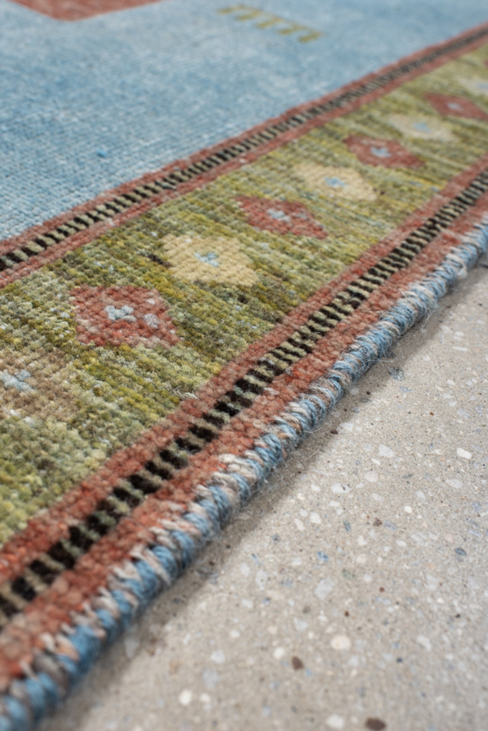 3' x 9' one-of-a-kind handmade vintage Gabbe runner rug. Color palette: sky blue, sage, rust, olive, ivory, charcoal, rose