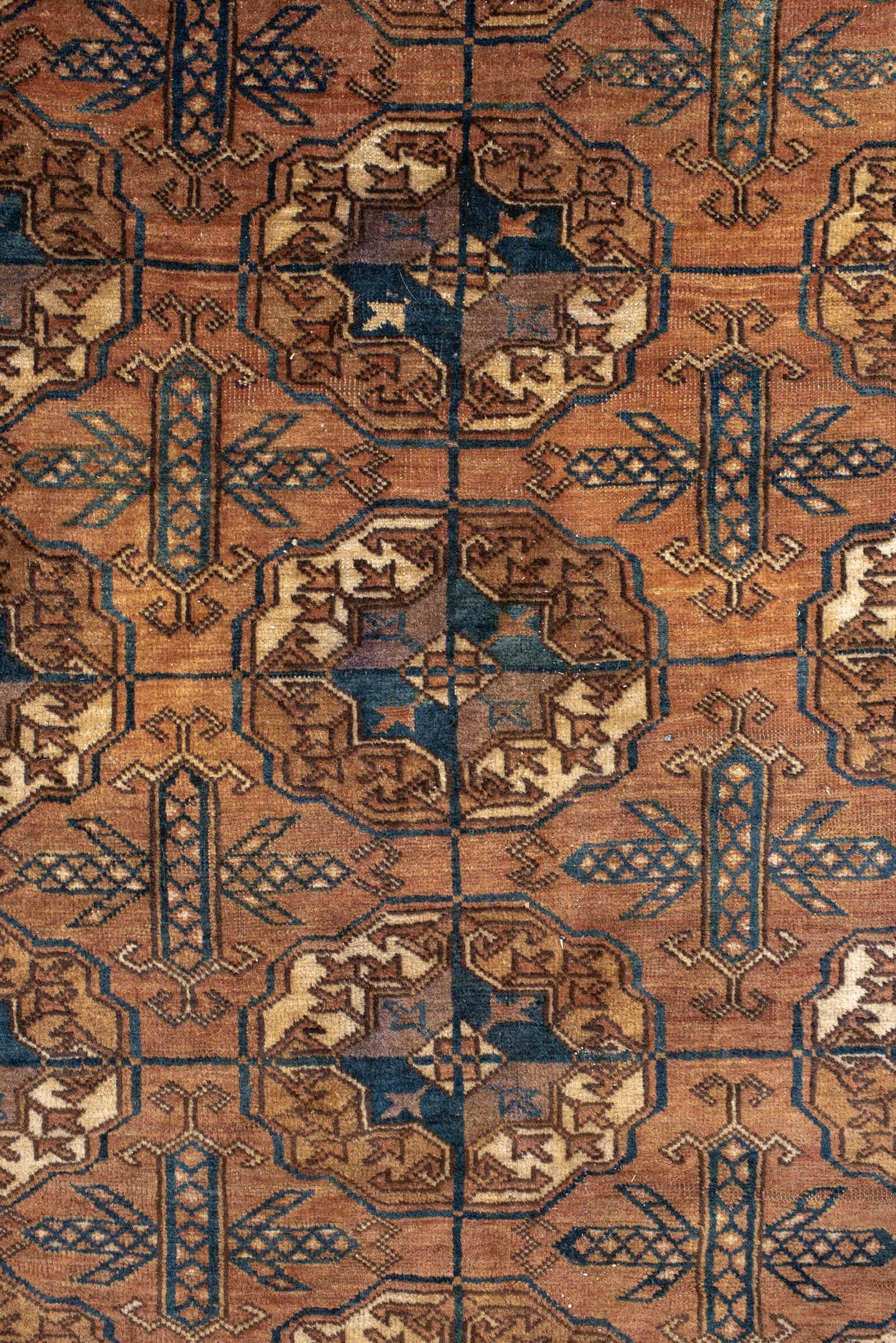 6' x 10' one-of-a-kind handmade antique Torkaman large size rug. Color palette: terra cotta, brown, navy, ivory, camel