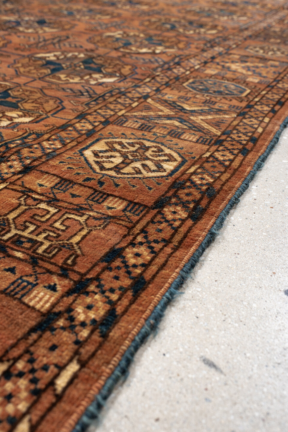 6' x 10' one-of-a-kind handmade antique Torkaman large size rug. Color palette: terra cotta, brown, navy, ivory, camel