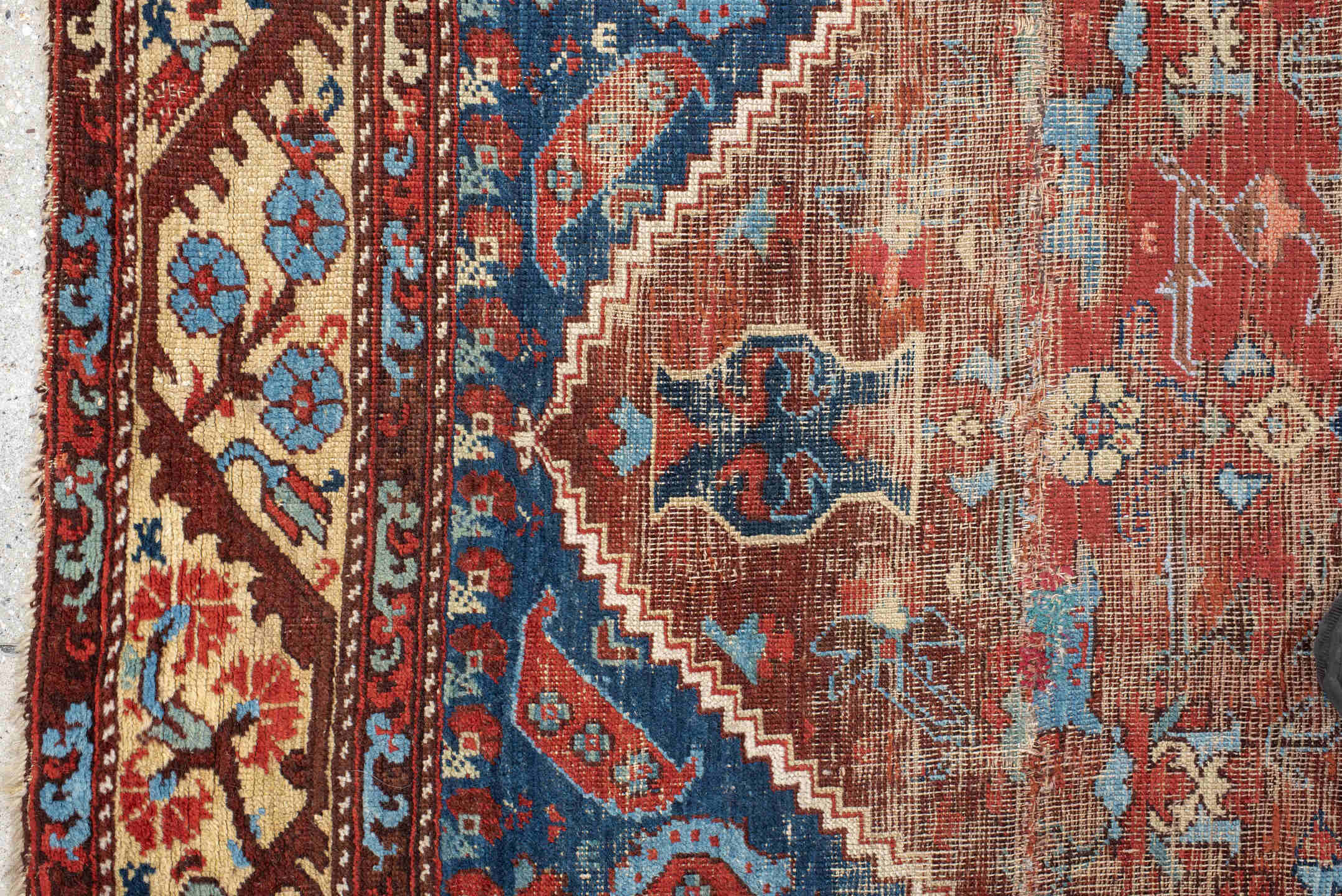 4' x 4' one-of-a-kind handmade vintage Anatolian small size rug. Color palette: blue, brown, gray, off-white, orange, pink