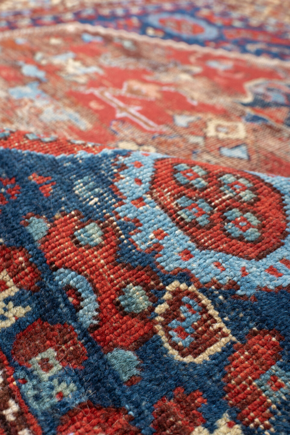 4' x 4' one-of-a-kind handmade vintage Anatolian small size rug. Color palette: blue, brown, gray, off-white, orange, pink