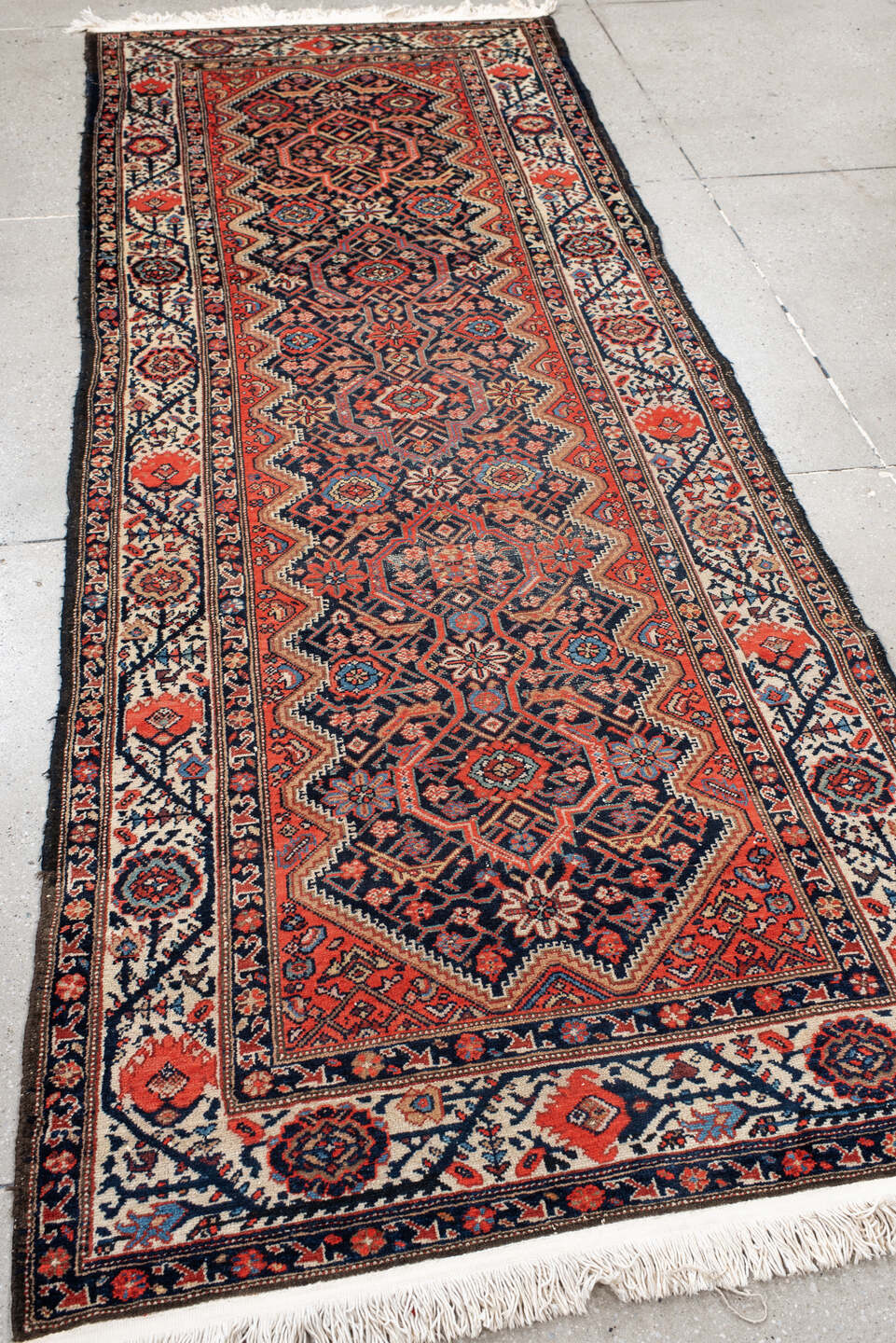 3' x 9' one-of-a-kind handmade antique Malayer runner rug. Color palette: navy, ivory, rust, crimson, sky blue, camel, blue