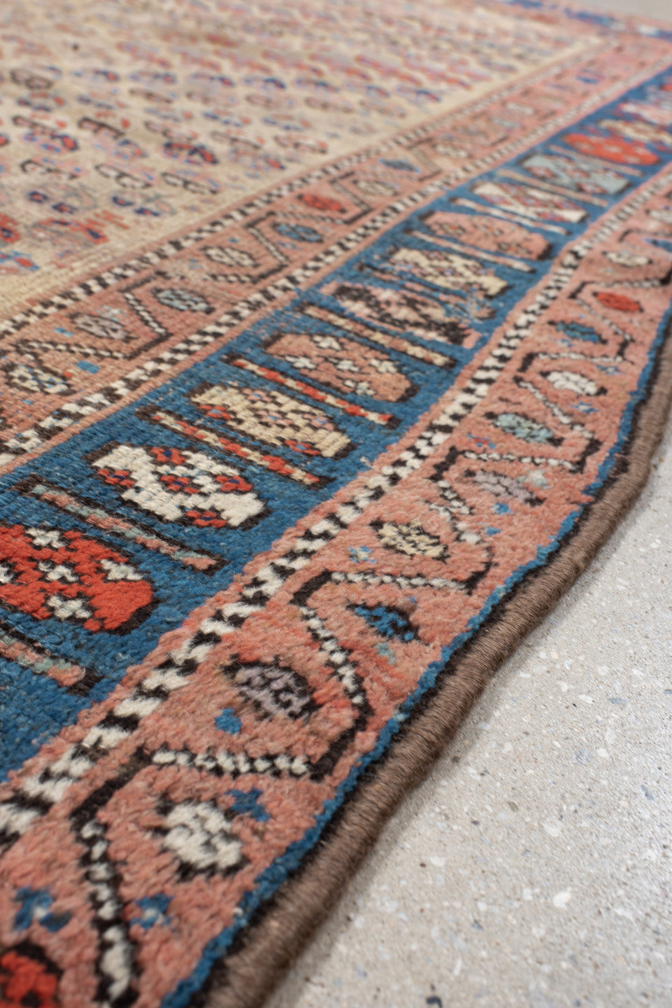 4' x 6' one-of-a-kind handmade vintage Kurd small size rug. Color palette: ivory, indigo, rose, rust, sky blue, charcoal