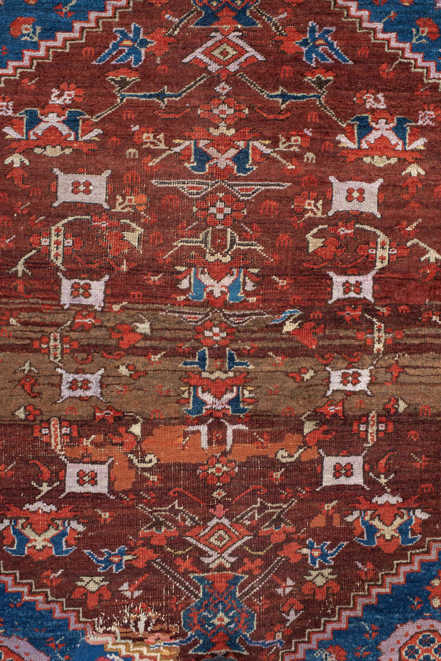 4' x 5' one-of-a-kind handmade vintage Anatolian small size rug. Color palette: blue, rust, ivory, terracotta, brown