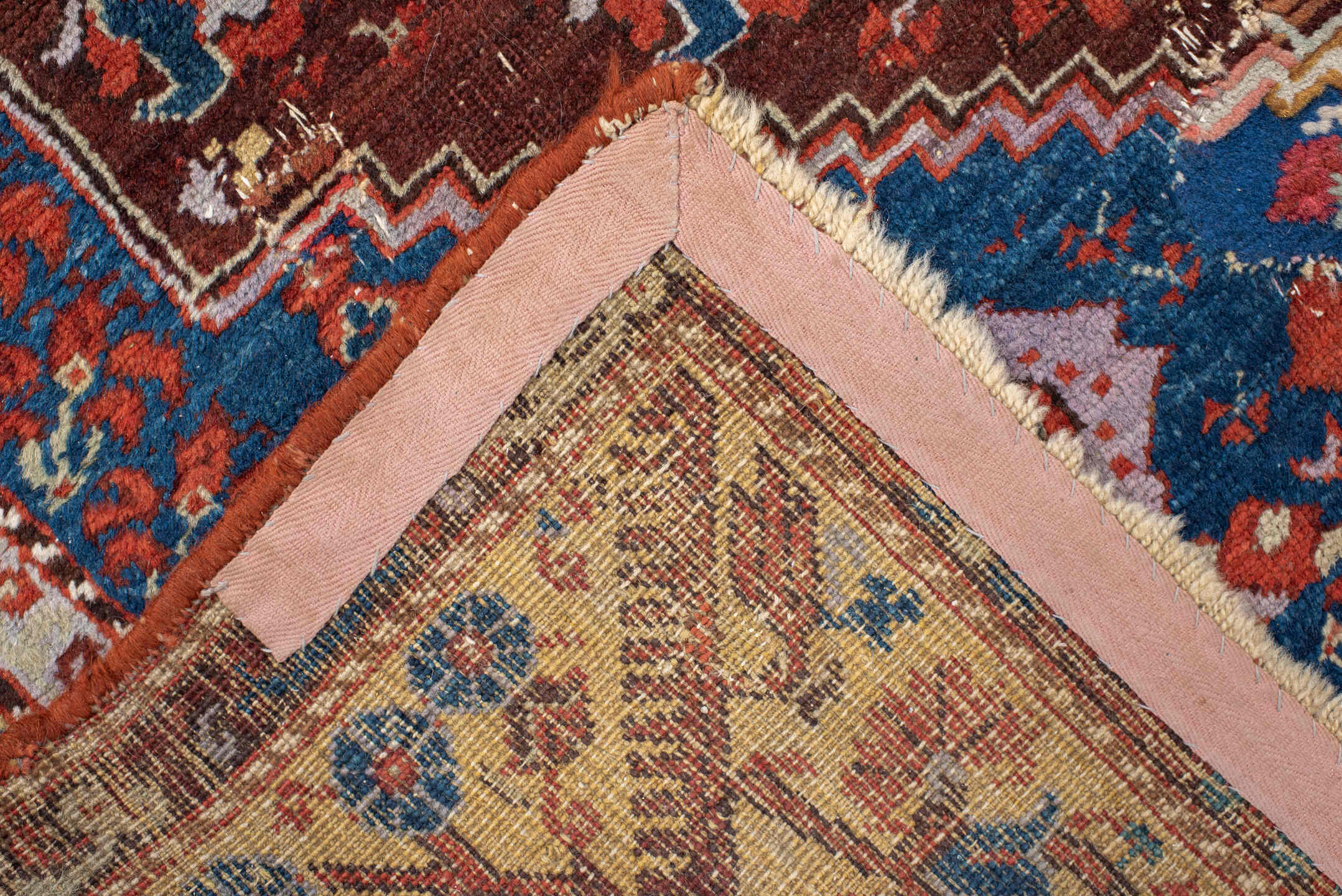4' x 5' one-of-a-kind handmade vintage Anatolian small size rug. Color palette: blue, rust, ivory, terracotta, brown