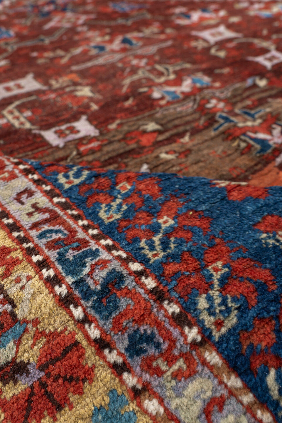 4' x 5' one-of-a-kind handmade vintage Anatol small size rug. Color palette: red, blue, gray, brown, off-white, orange