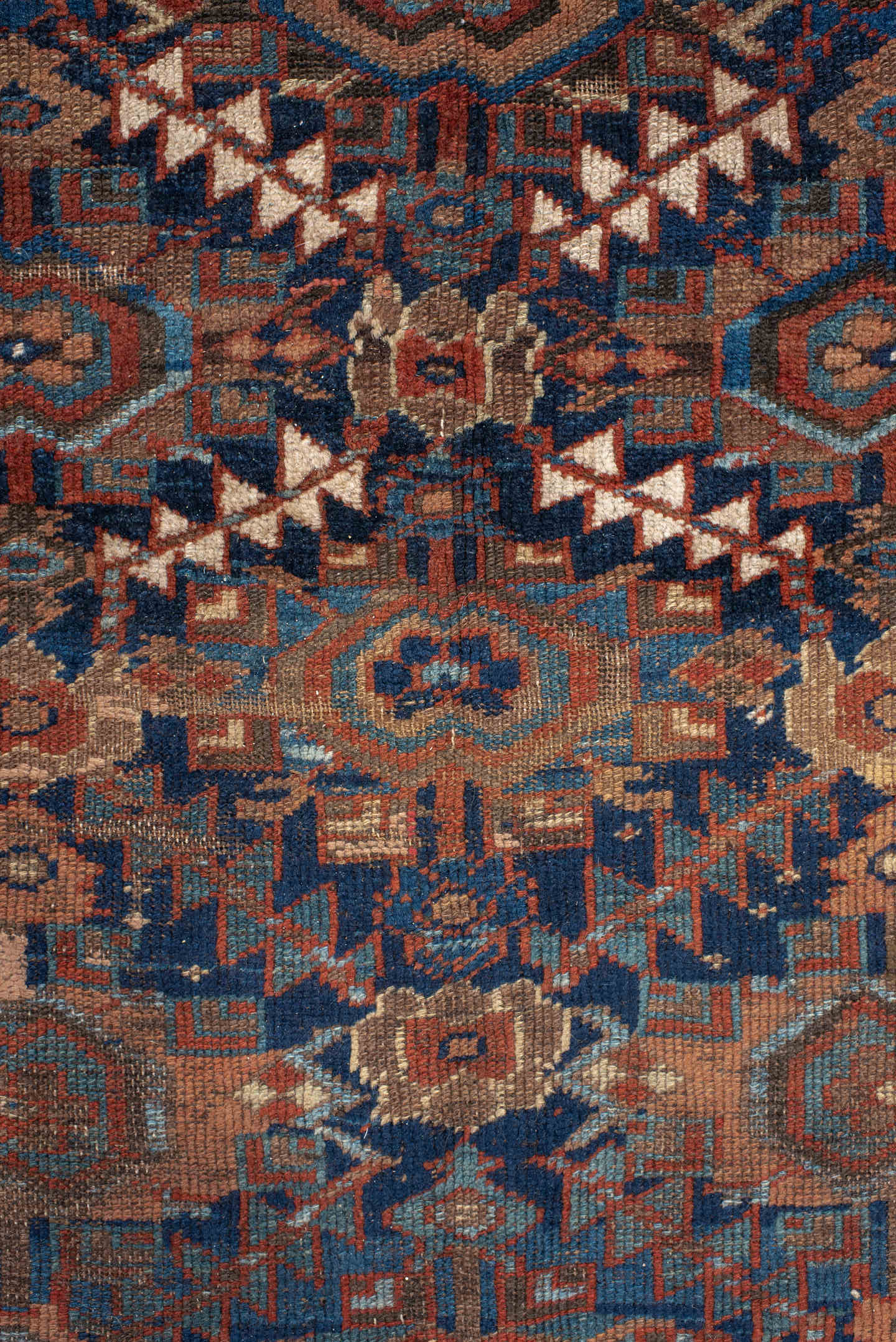 4' x 7' one-of-a-kind handmade vintage Kurd rug. Color palette: navy, rust, ivory, camel, sky blue, taupe, terracotta, blue