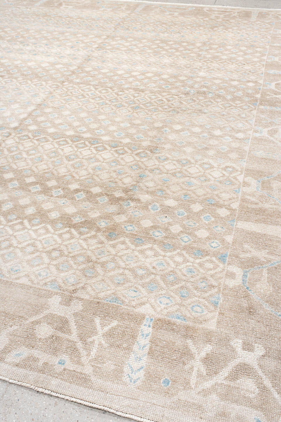 12' x 14' one-of-a-kind handmade vintage Trs oversize rug. Color palette: beige, ivory, taupe, pale blue, cream, gray