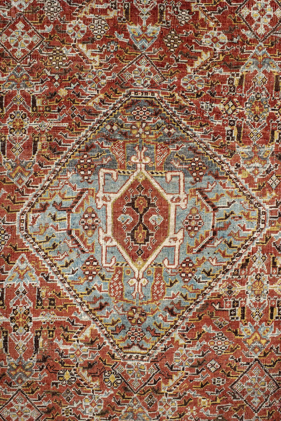 6' x 9' one-of-a-kind handmade vintage Qashqai medium size rug. Color palette: rust, light blue, ivory, brown, charcoal