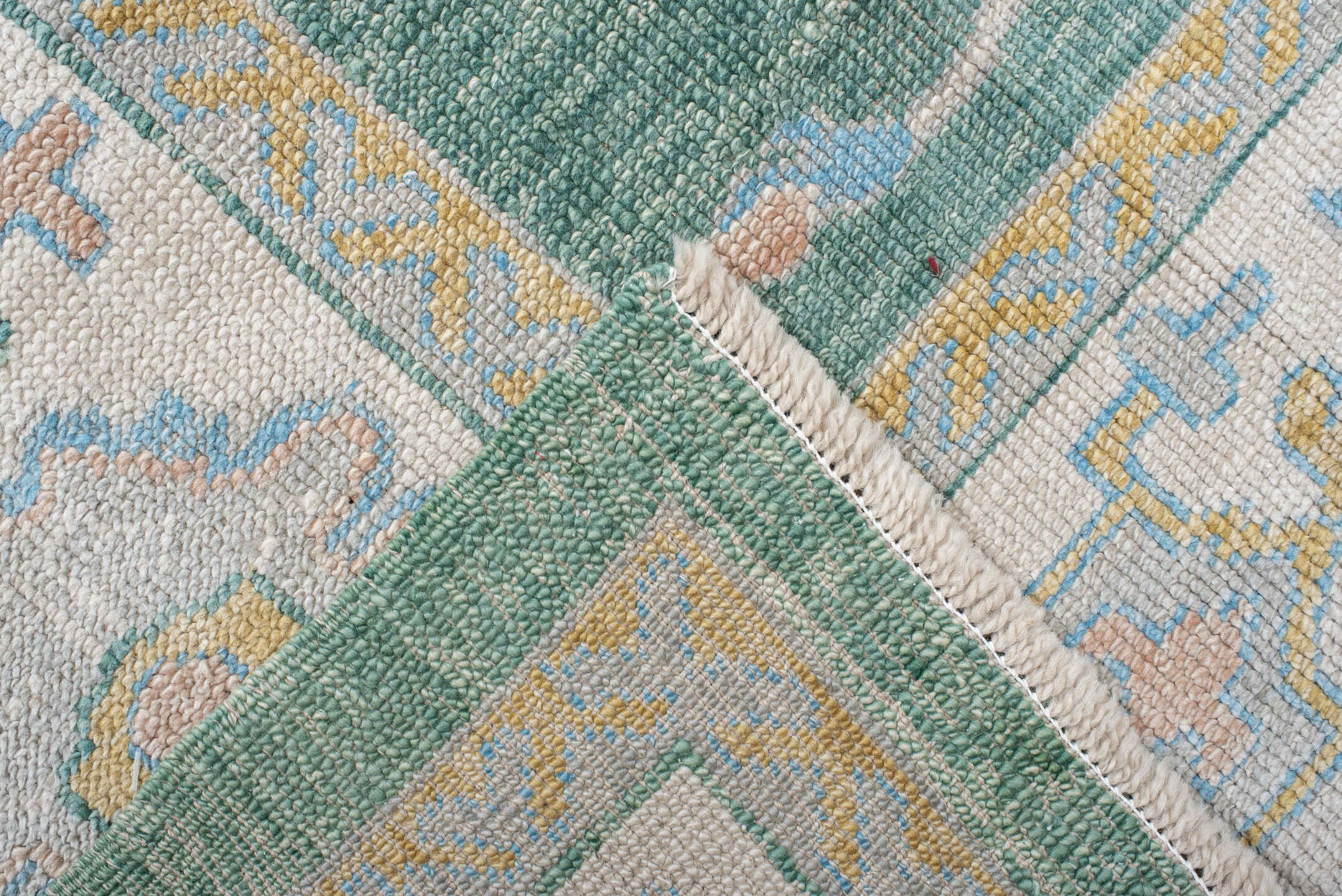 8' x 9' one-of-a-kind handmade vintage Oushak rug. Color palette: seafoam, ivory, pale gold, blush, powder blue, sage, teal