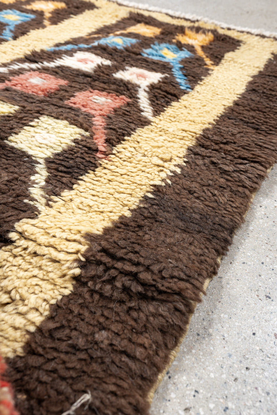 3' x 6' one-of-a-kind handmade vintage Tulu rug. Color palette: brown, ivory, sky_blue, coral, saffron, cream, light blue