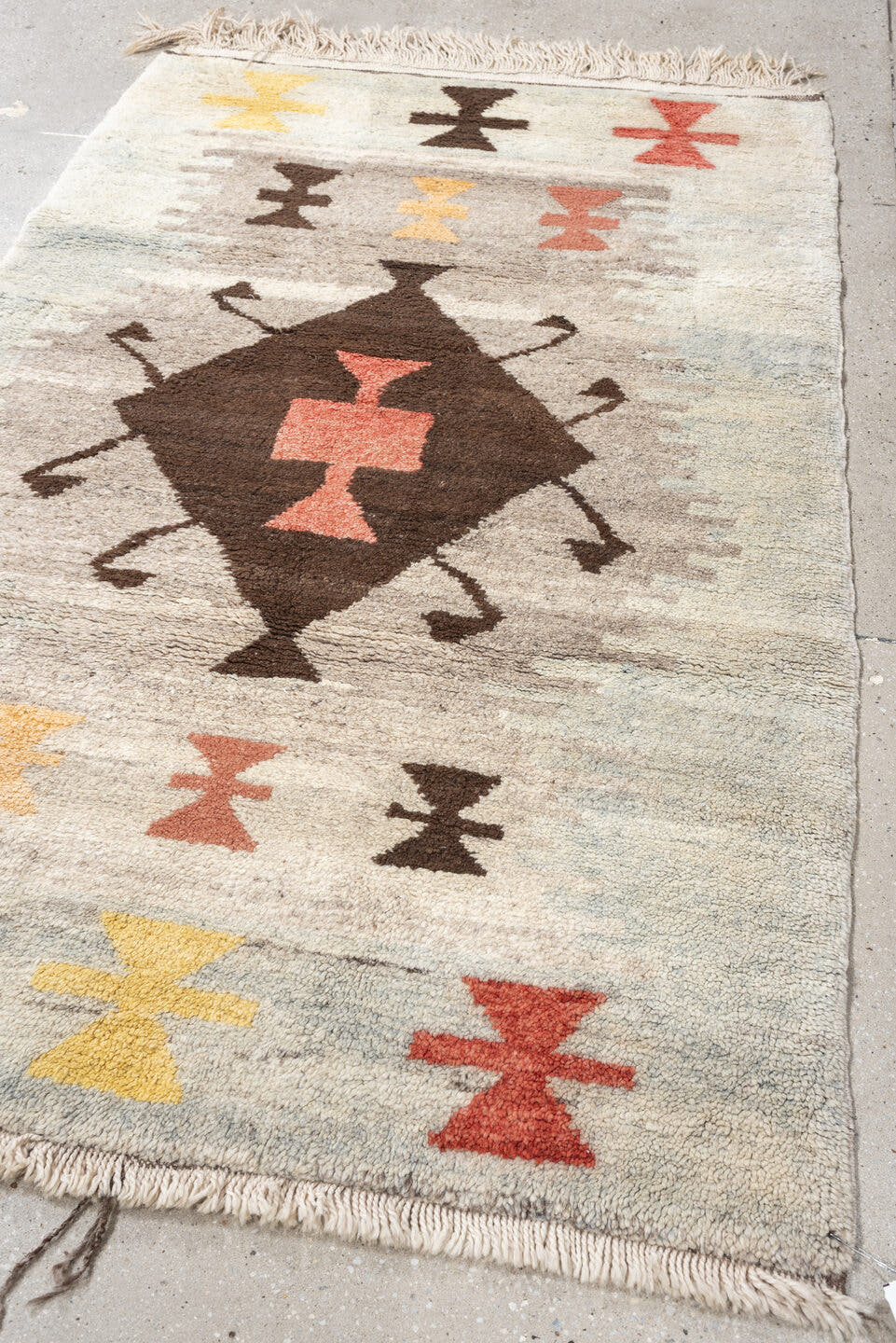 4' x 6' one-of-a-kind handmade vintage Moroccan rug. Color palette: ivory, brown, taupe, coral, gold, charcoal, peach, beige