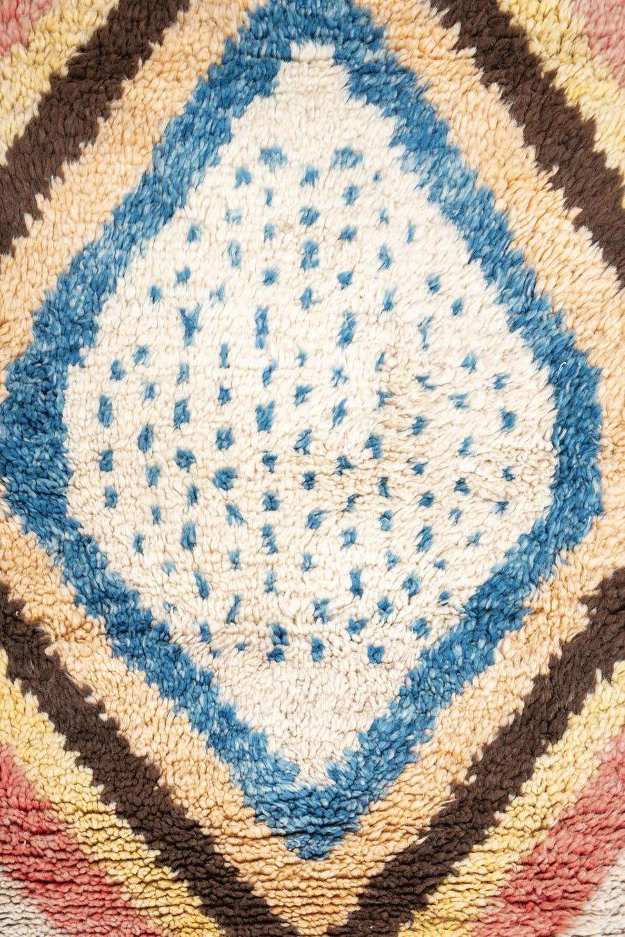 4' x 6' one-of-a-kind handmade vintage Moroccan small size rug. Color palette: ivory, rose, brown, blue, gold, peach, taupe