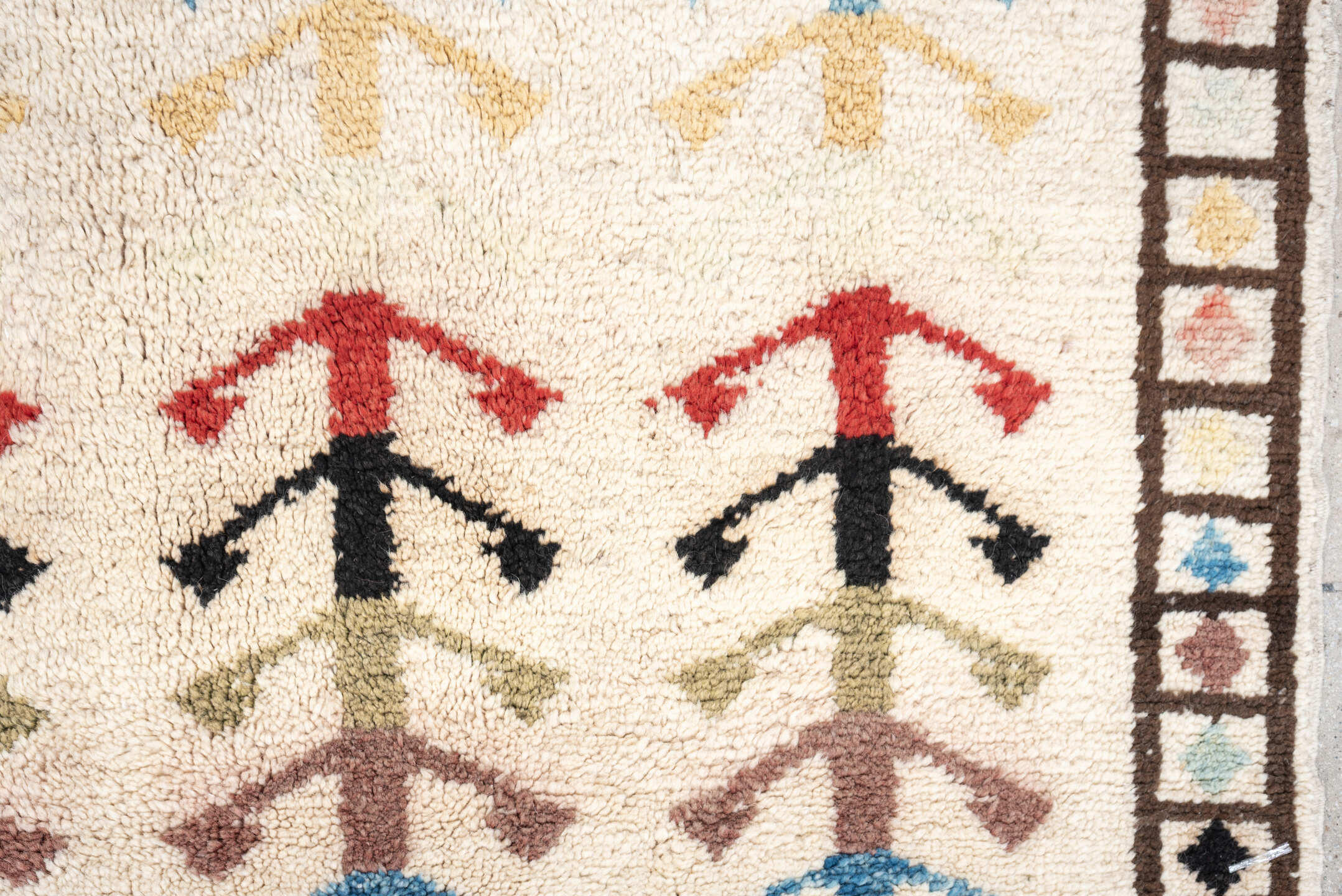 5' x 7' one-of-a-kind handmade vintage Tulu rug. Color palette: ivory, brown, sky blue, coral, blush, mustard, black, sage