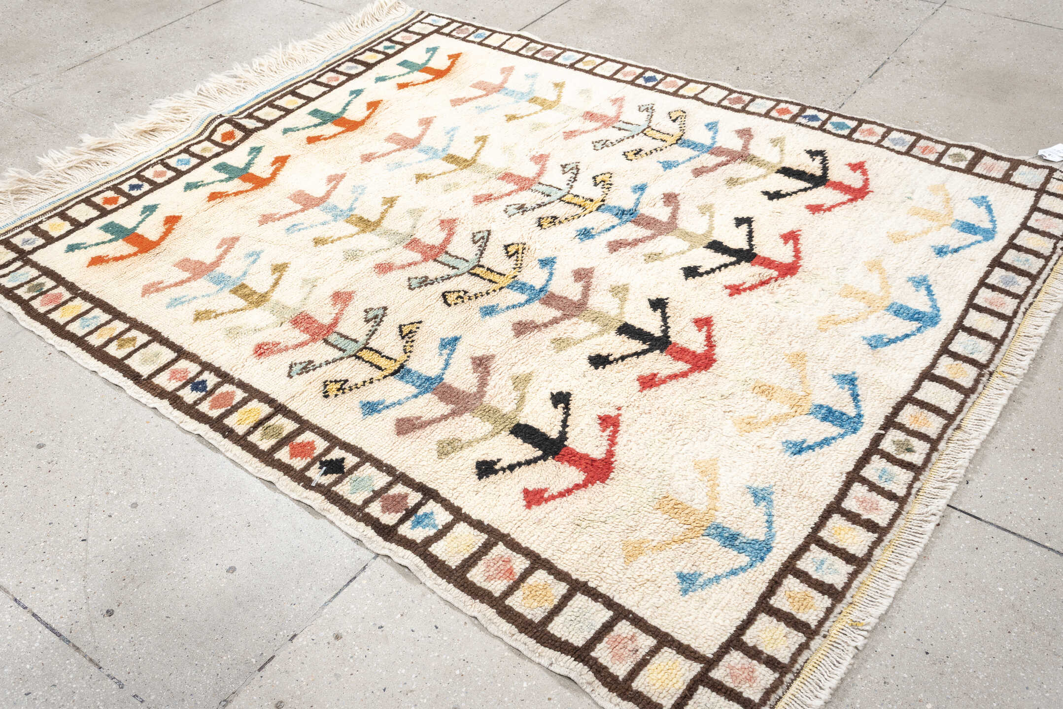 5' x 7' one-of-a-kind handmade vintage Tulu rug. Color palette: ivory, brown, sky blue, coral, blush, mustard, black, sage