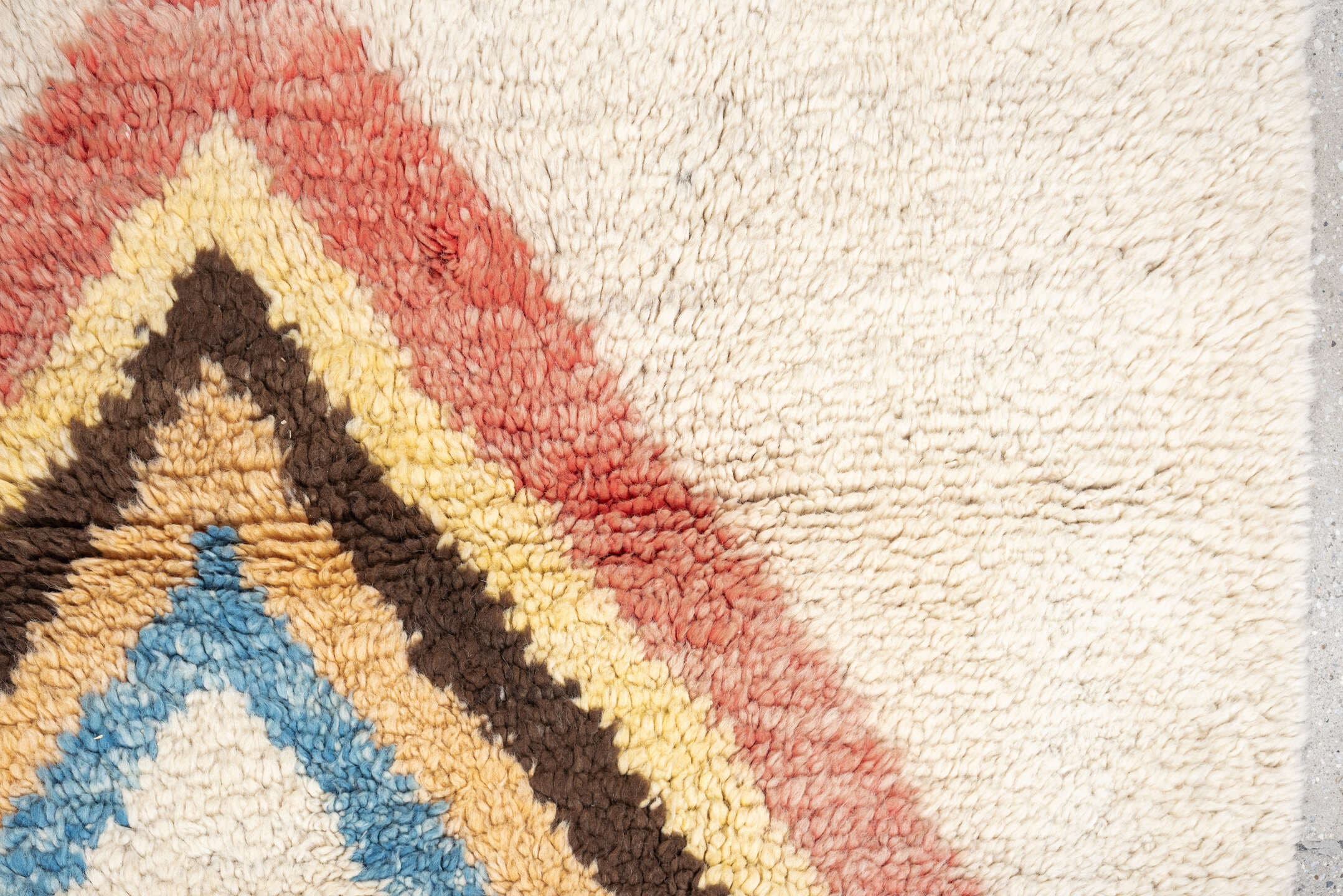 4' x 6' one-of-a-kind handmade vintage Tulu small size rug. Color palette: ivory, rose, brown, sky_blue, peach, gold, taupe