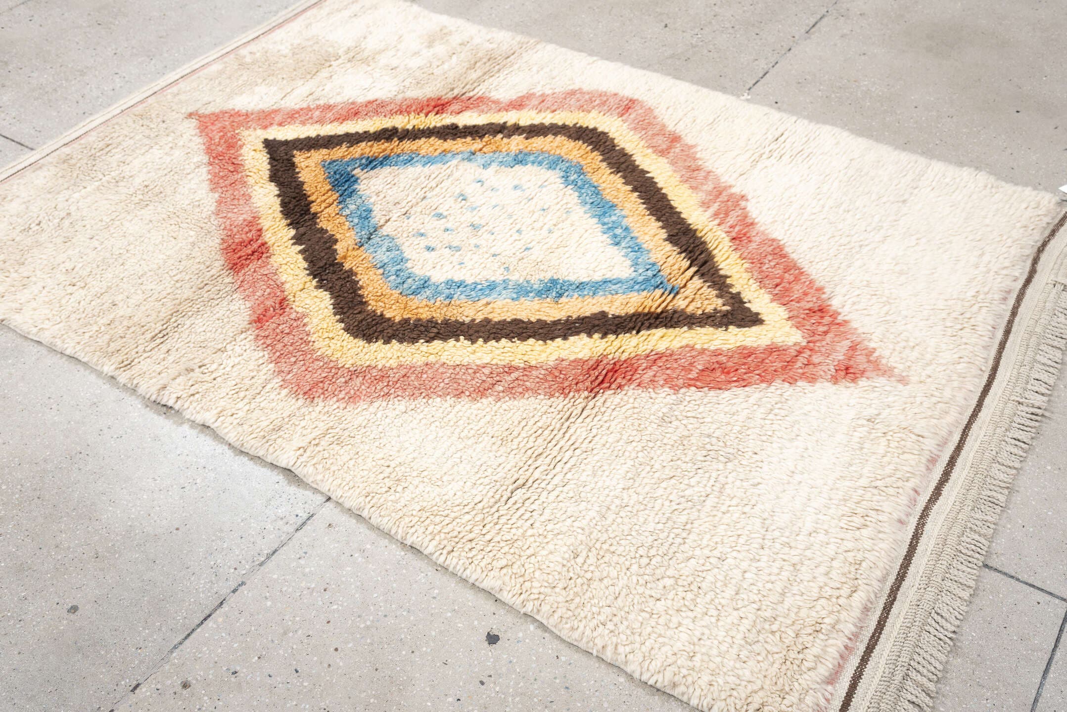 4' x 6' one-of-a-kind handmade vintage Tulu small size rug. Color palette: ivory, rose, brown, sky_blue, peach, gold, taupe