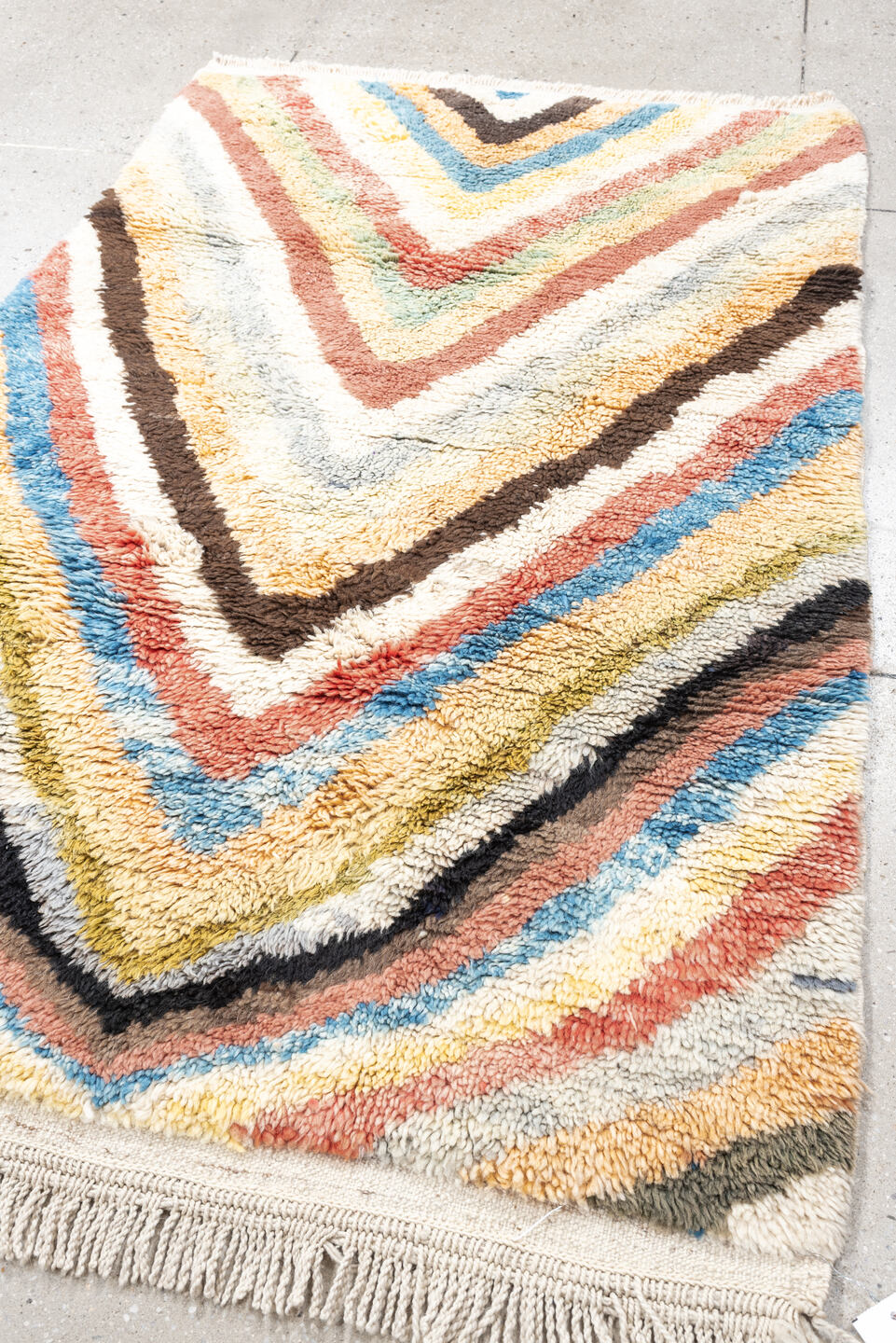 4' x 6' one-of-a-kind handmade vintage Moroccan small size rug. Color palette: ivory, peach, sky_blue, blush, brown