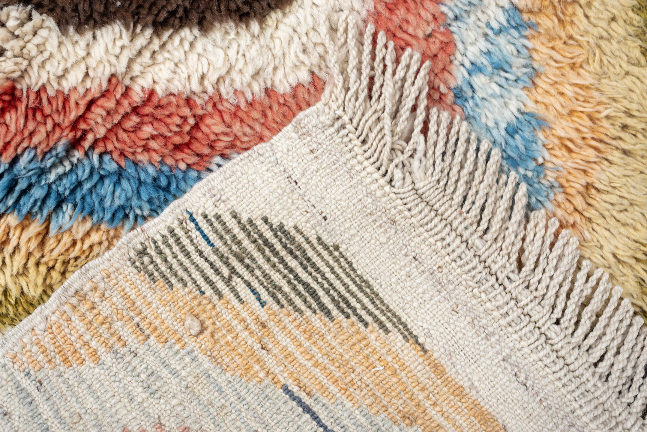 4' x 6' one-of-a-kind handmade vintage Moroccan small size rug. Color palette: ivory, peach, sky_blue, blush, brown