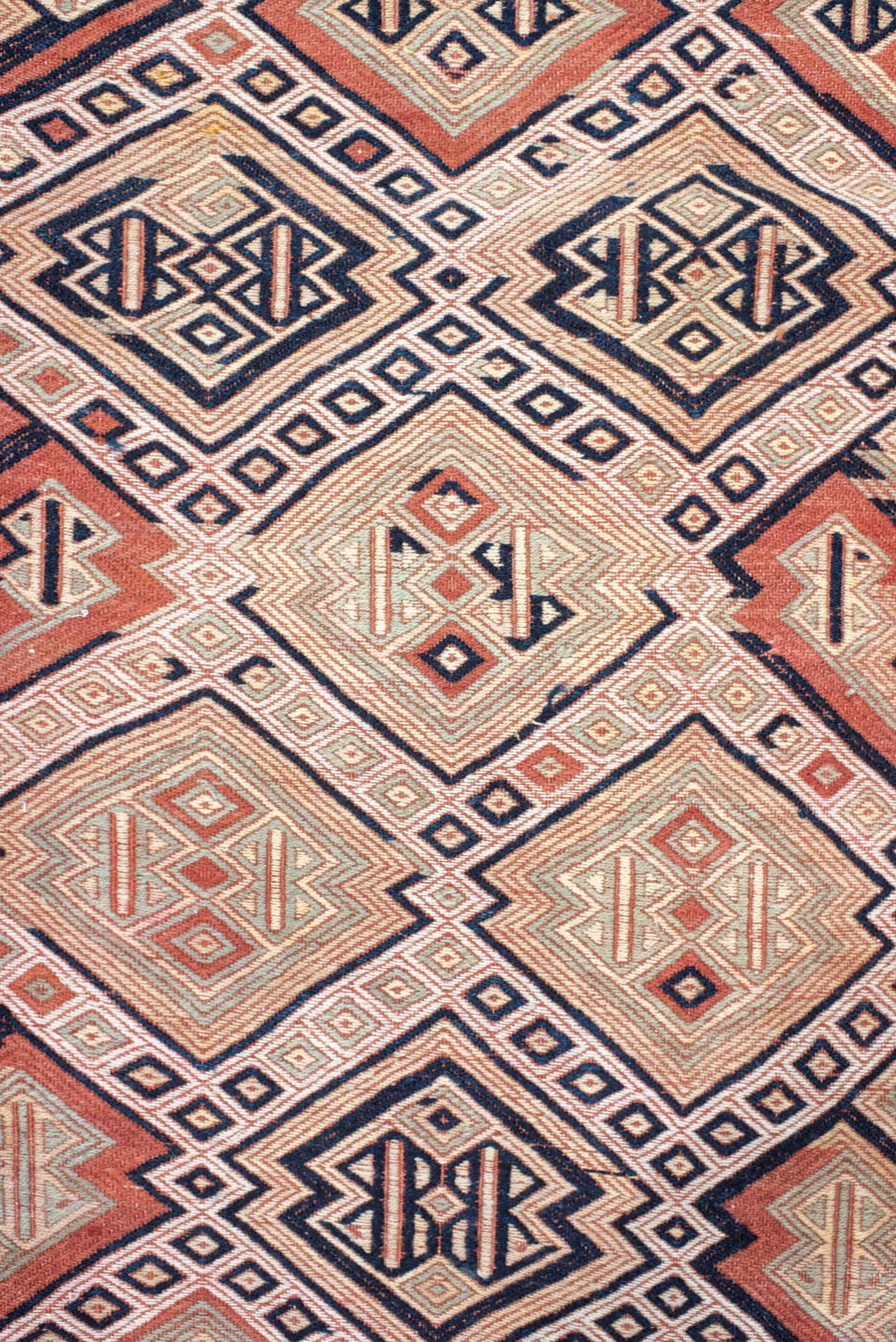 2' x 12' one-of-a-kind handmade vintage Jijim runner rug. Color palette: ivory, terra cotta, charcoal, rust, camel