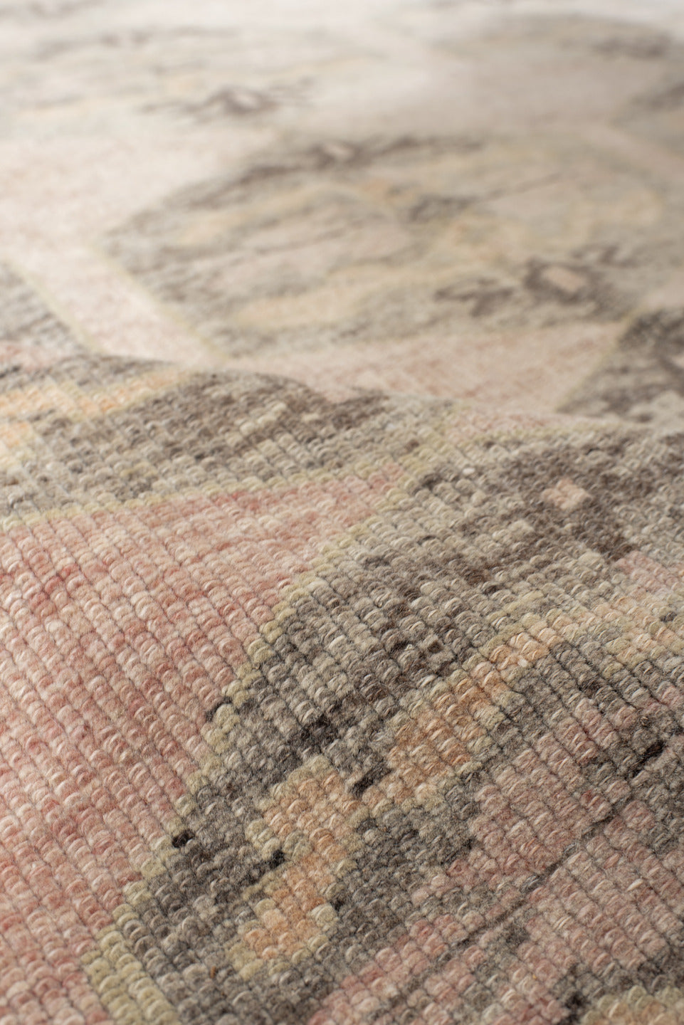 4' x 9' one-of-a-kind handmade vintage Kars runner rug. Color palette: brown, gray, light gray, off-white, orange, pink