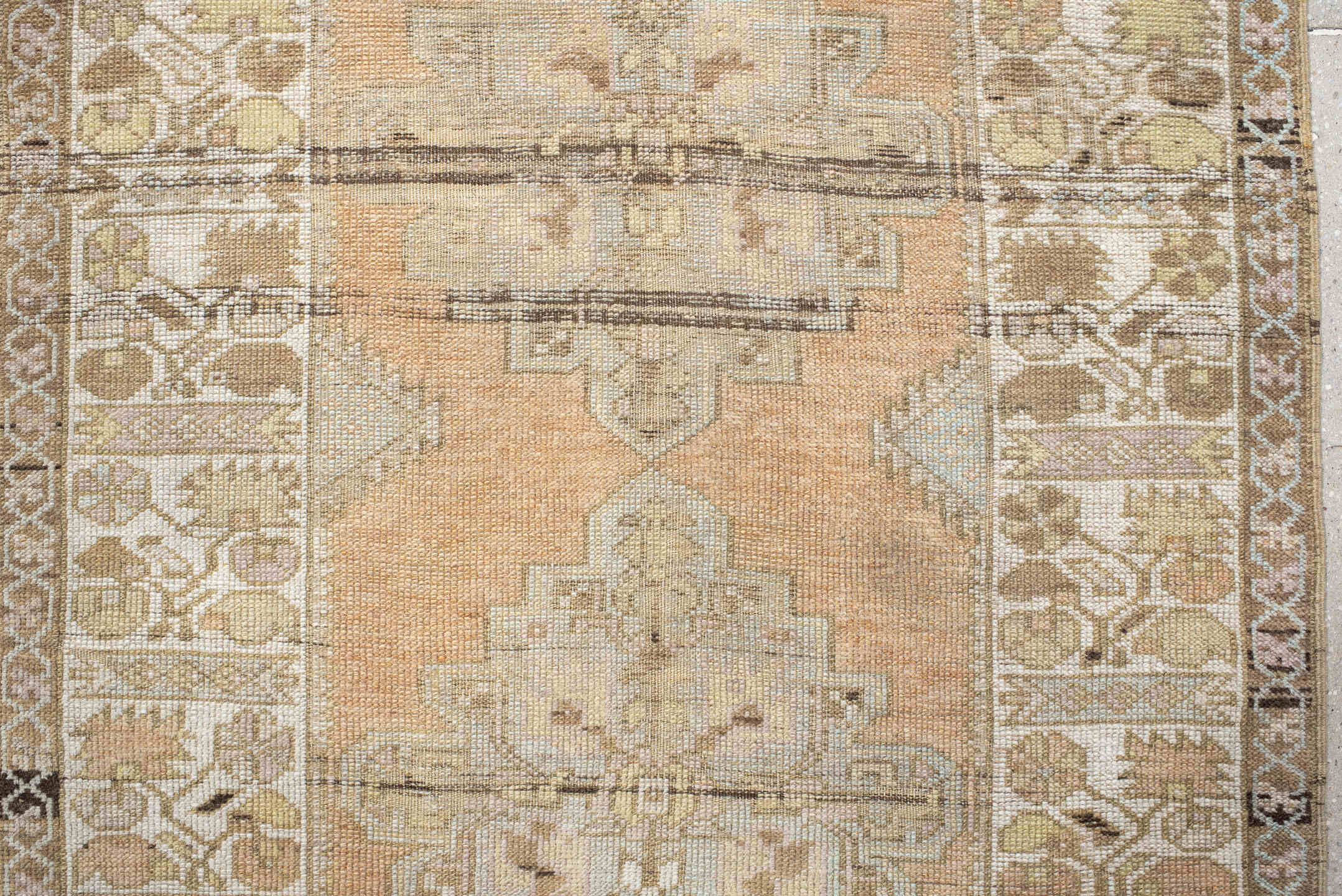 3' x 10' one-of-a-kind handmade vintage Oushak runner rug. Color palette: peach, ivory, taupe, sage, camel, charcoal, cream